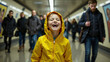 © Enixanne - A child laughing in a crowded subway station.