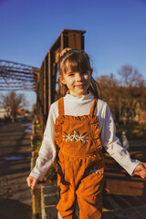 Wall Mural - portrait of a little girl in the park