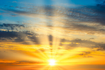 Wall Mural - sunset sky with sunset clouds, sun rays and dramatic sky