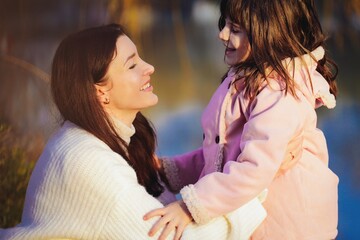 Wall Mural - portrait of a mother with her child 