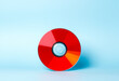© Jacks Studio - Shiny red vinyl record on colorful gradient background