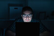 © Anna Carlotta  Geler - One geek guy using laptop at night