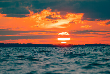 Wall Mural - Sunset on the sea coast.