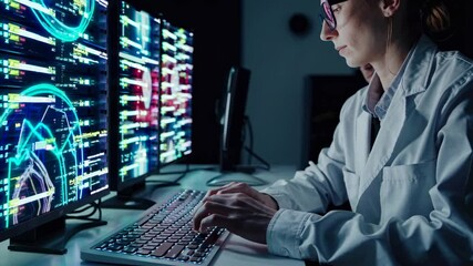Leinwandbilder - Experts analyze data trends in a high-tech laboratory setting during the evening hours