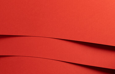Poster - Fiesta red and orange paper background with curved, smooth layers and a matte finish. Rich, saturated tones and a polished surface create a vibrant, bold, and elegant design with a refined and modern