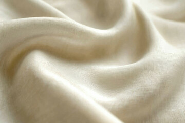 Leinwandbilder - Cream-colored fabric with soft, flowing folds, showcasing its texture and drape.