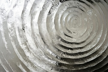 Aufkleber - Abstract concentric circles in grayscale, created with textured paint strokes, resembling a metallic surface.