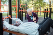 © Marko Geber - Senior men working out at outdoor park gym