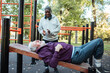 © Marko Geber - Senior men working out at outdoor park gym