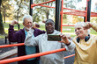 © Marko Geber - Senior men flexing muscles at outdoor park gym