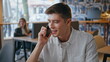 © stockbusters - Closeup businessman talking mobile phone at workplace. Happy smiling man calling