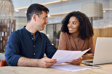 Wall Mural - professional happy busy business team of two diverse employees man and woman, manager and client or 