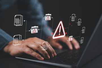 Fototapete - Warning alert icon with a hacked document system.Man typing on a keyboard with a red cybersecurity threat alert, surrounded by digital files and documents.