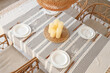 © Pixel-Shot - Table setting with candles in dining room