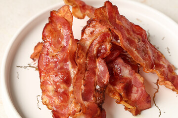 Wall Mural - Plate with fried bacon rashers on white background, closeup