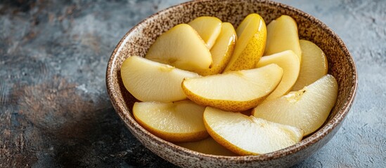 Wall Mural - Bowl of homemade stewed pear slices on a rustic table with empty copyspace for text or branding purposes.