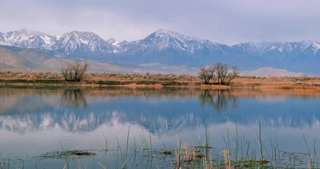 Wall Mural - scenic view of sierra mountains with perfect reflections.