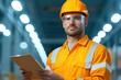 © JAKE STUDIO - A construction worker in safety gear holds a clipboard, standing in a brightly lit industrial environment, emphasizing workplace safety and professionalism.