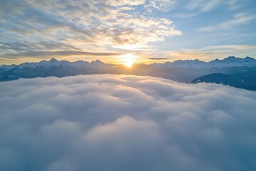 Wall Mural - Aerial Sunrise Above Mountain Cloud Sea