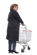 © ASDF - rear view. casual woman with shopping cart looking at the camera.