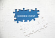 © monocle - Finding the hidden costs concept. when open the puzzle