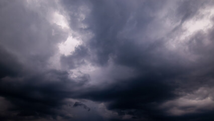 Wall Mural - dark sky with stormy clouds. dramatic sky rain,dark clouds before a thunder-storm.