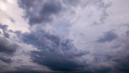 Wall Mural - Dark sky with stormy clouds. Dramatic sky rain,Dark clouds before a thunder-storm.