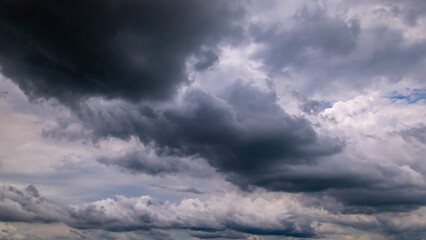 Wall Mural - dark sky with stormy clouds. dramatic sky rain,dark clouds before a thunder-storm.