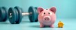 © Pete - Pink piggy bank, dumbbells represent saving for fitness goals. Healthy lifestyle investment shown. Financial planning for personal well-being highlighted. Smaller yellow piggy bank shown. Image