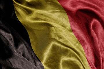 Wall Mural - shine waving colourful realistic national flag of belgium . macro shot