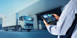 © panuwat - Gps tracking logistic warehouse manangement system concept.Man hand using digital tablet on blurred delivery truck as background