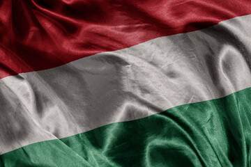 Wall Mural - shine waving colourful realistic national flag of hungary . macro shot