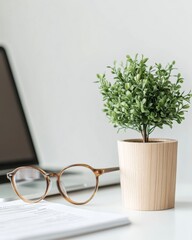 Leinwandbilder - Minimalist Financial Workspace Sleek Laptop, Chart Display, and Wooden Desk Plant - Enhancing Digital Collaboration and Innovation in Modern Banking Environments