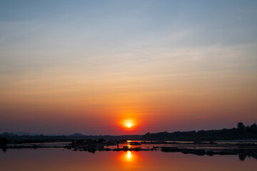 Wall Mural - panoramic beautiful sunset sky, cloud in twilight - nature background. view of sunset over the mekon