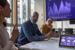 © ReeldealHD images - Mature African American businessman listening in a team meeting