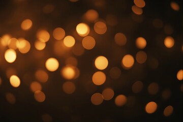 Wall Mural - abstract golden bokeh lights on a dark background creating a warm glowing effect.