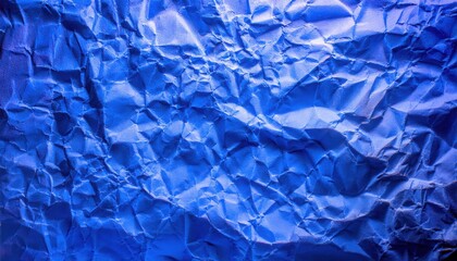 Poster - textured close-up of crumpled blue paper with intricate folds and shadows, ideal for background, design projects, or graphic art use
