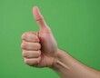 © Eky Epsa - Thumbs up gesture on green screen