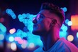© michnik101 - Stylish young man in neon lighting with glasses, looking thoughtful. Futuristic urban lifestyle concept.
