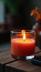 Wall Mural - Glass container beside a softly burning flame, warmth, glass, wood