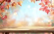 © ANUAR - Vibrant Autumn Leaves Framing a Rustic Wooden Table with a Dreamy Background of Soft Focus Leaves and Gentle Bokeh Effect in Warm Fall Colors