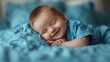 © YZN - Smiling baby sleeping soundly on blue bedding in bedroom