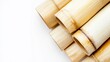 © STwul - Stacked bamboo tubes on white background, copy space