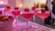 © Tobi - Stylish Valentine's networking event with an array of pink cocktails and appetizers on display