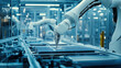 © Shivani - A robotic arm performing an automated process on microchips in the production line of electric vehicle parts, close-up shot.