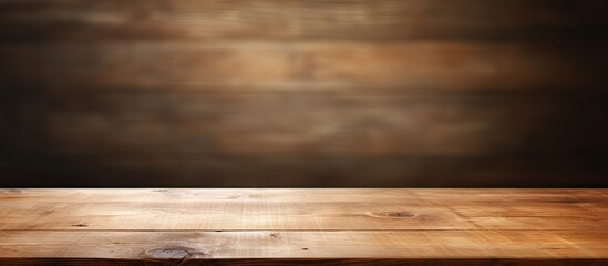 Poster - Wooden table surface in warm brown tones against a textured dark brown background creating an inviting space for text or images.
