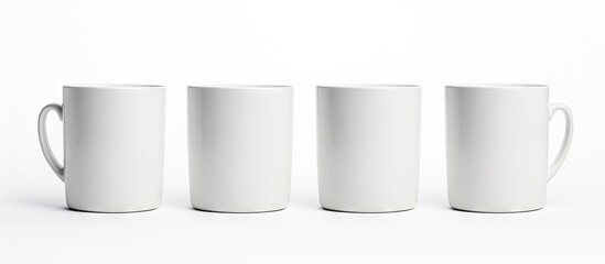 Fototapete - Minimalist coffee cup mockup arrangement on a clean white background featuring four empty white mugs perfect for branding and logos