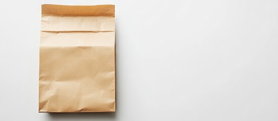 Poster - Brown paper bag on the right side of a clean white background showcasing a realistic folded design ideal for multiple creative applications