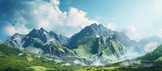 Wall Mural - Majestic high mountains under a bright blue sky with fluffy white clouds surrounded by lush green valleys and mist in the morning light
