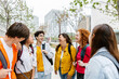 © Xavier Lorenzo - Young group of multiracial teenage students laughing and hanging out at high school campus. Youth and education lifestyle concept